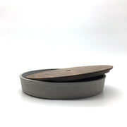 Part of the FS Collection, the FS BOX is a FS Cazuela with an hand-turned wooden lid. The hole in the center of the lid allows you to lift it easily with one finger. This versatile trinket box was originally designed to sit on desk or night stand, but it can be used anywhere in the house or office. 