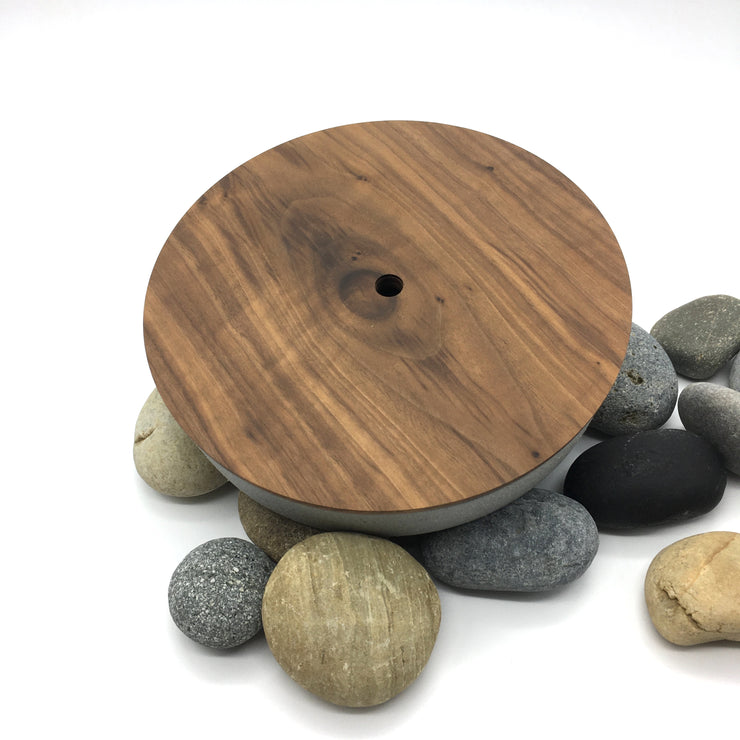Part of the FS Collection, the FS BOX is a FS Cazuela with an hand-turned wooden lid. The hole in the center of the lid allows you to lift it easily with one finger. This versatile trinket box was originally designed to sit on desk or night stand, but it can be used anywhere in the house or office. 